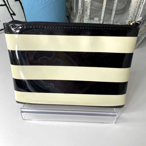 NWT Kate Spade black striped pouch